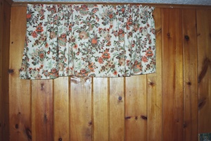 curtain over wooden wall